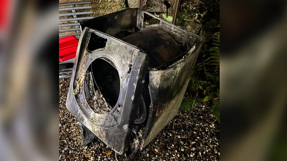 Burned out tumble dryer