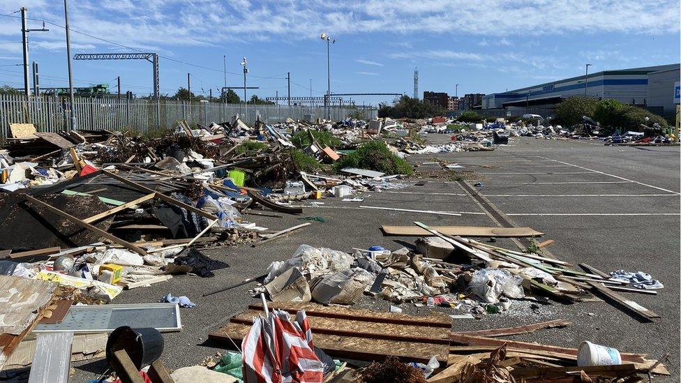 Waste dumped in a car park