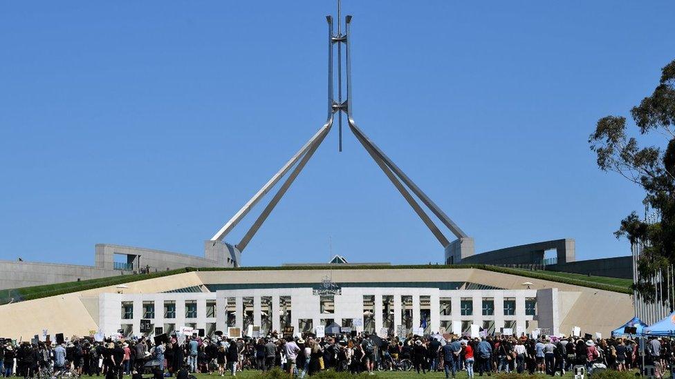 Protesters outside Australia's Parliament House