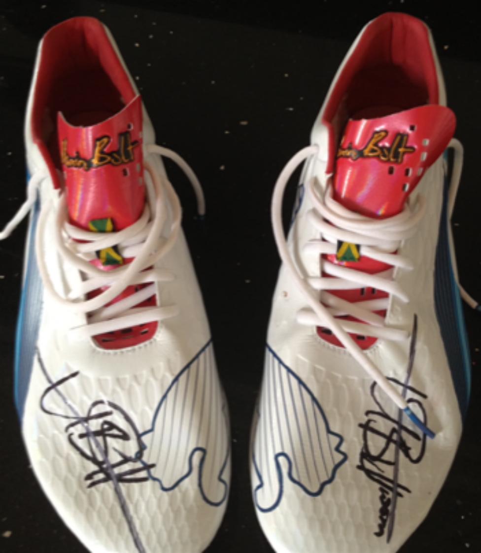 Shoes signed by Usain Bolt