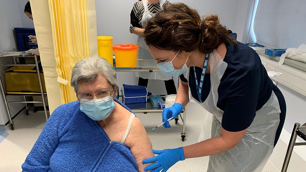 Vaccine being injected