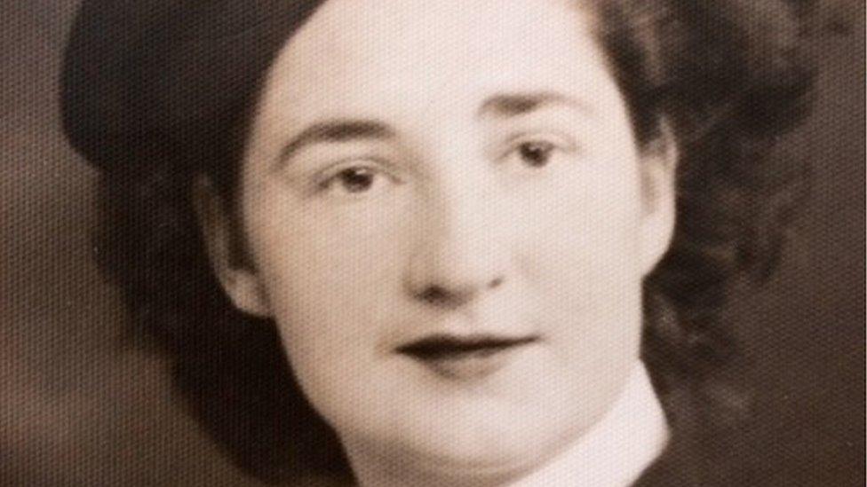 Old black and white photograph of Lorna Cockayne in her Navy uniform