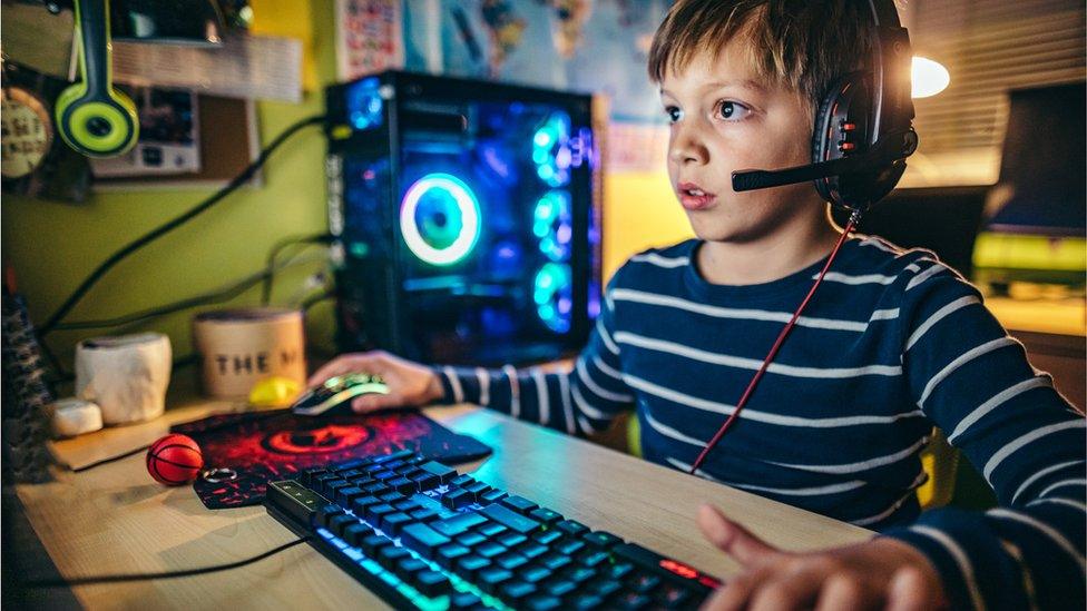 Boy playing a video game