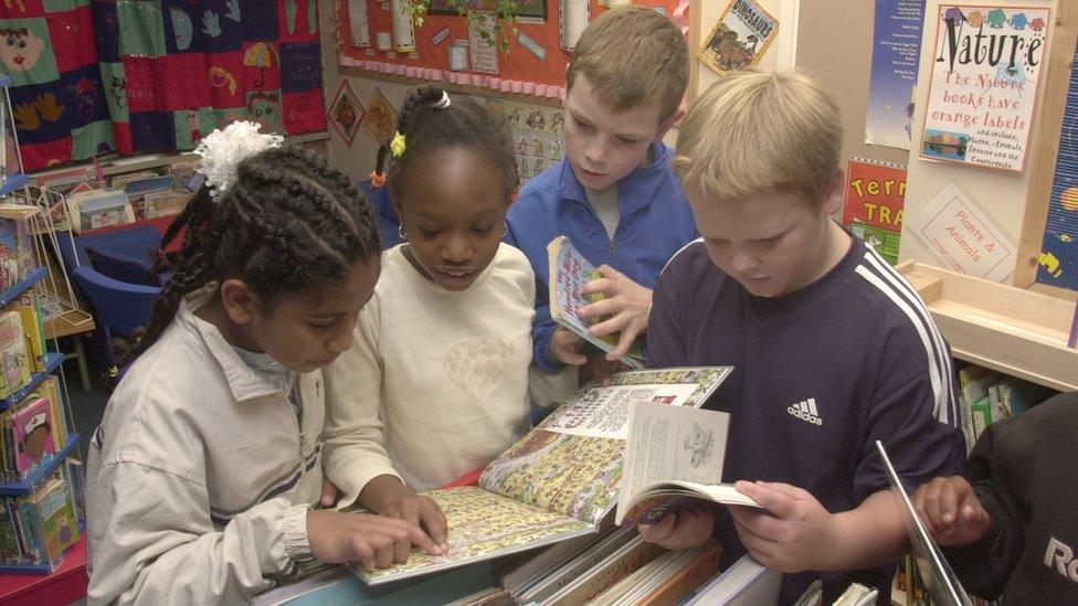 Children reading in library