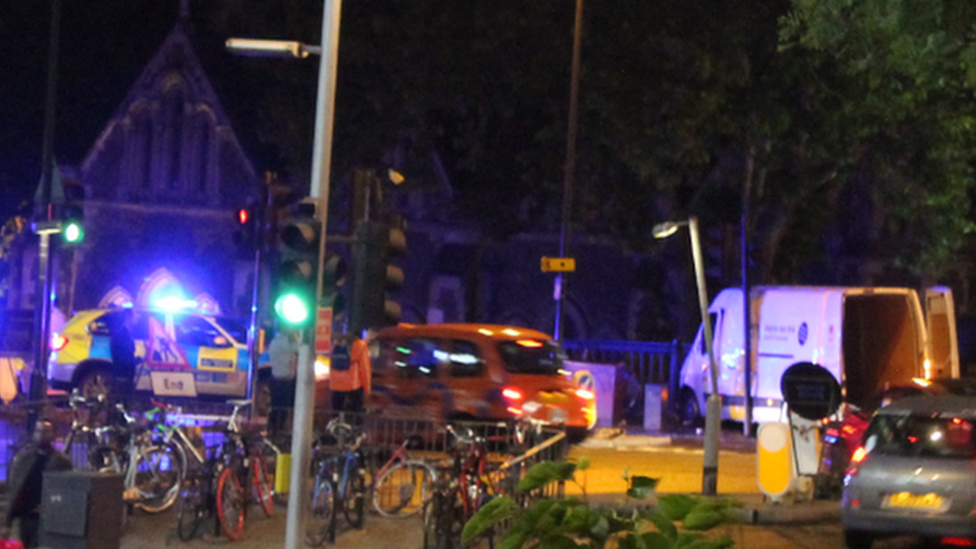 The white van, in the centre of this photo, is believed to have been used in the attack on London Bridge