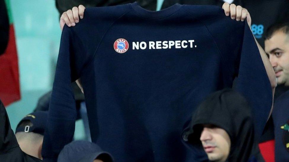 Bulgarian fans hold up a "No respect" jumper