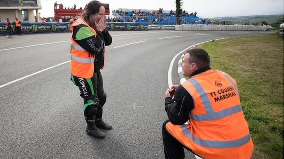 Marshal proposing to his girlfriend at the Isle of Man TT