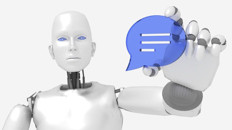 Female robot holding a speech bubble symbol