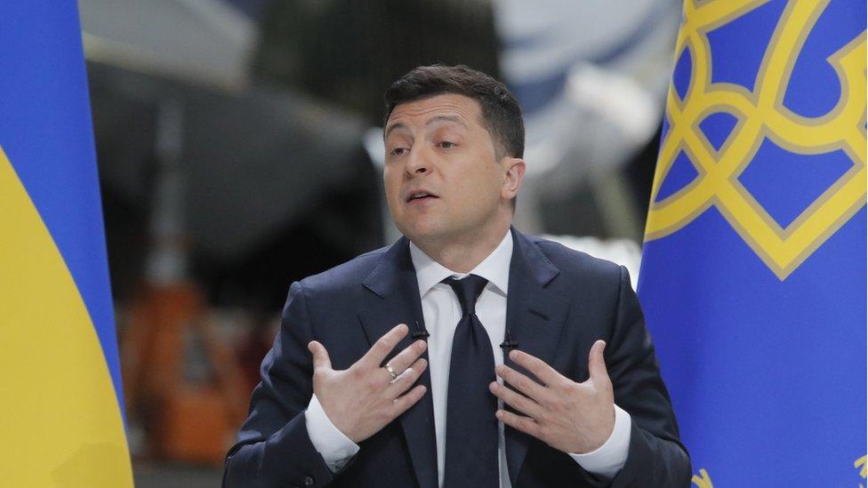 Ukrainian President Volodymyr Zelensky speaks during a press conference at the Antonov aircraft plant in Kiev, Ukraine, 20 May 2021