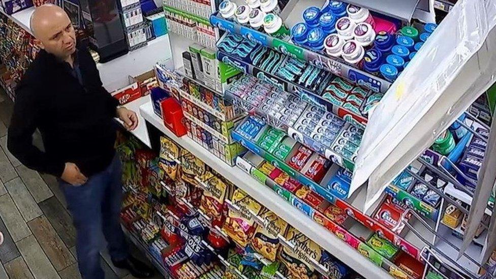 Gheorghe Nica in a shop