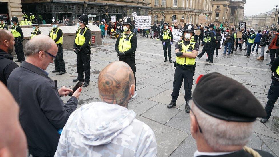 Opposing protest groups at Newcastle's Grey's Monument