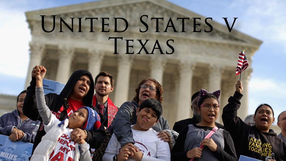 Pro-immigration protesters stand outside the US Supreme Court.