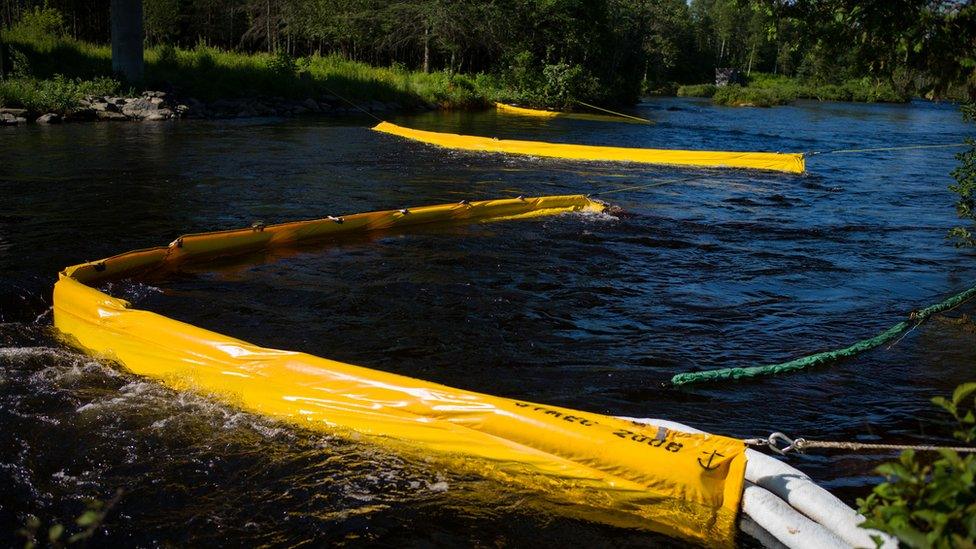 Oil catch filters on the Chaudiere River, in Lac-Megantic