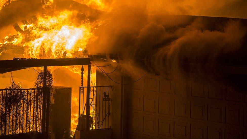 A house on fire in Malibu, 9 November 2018