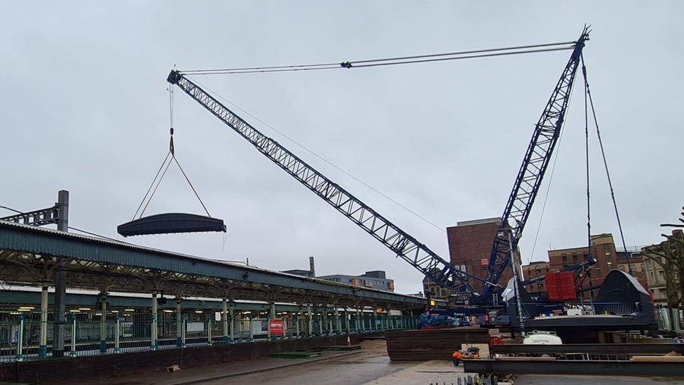 Photos taken on Christmas Day of the bridge being fitted