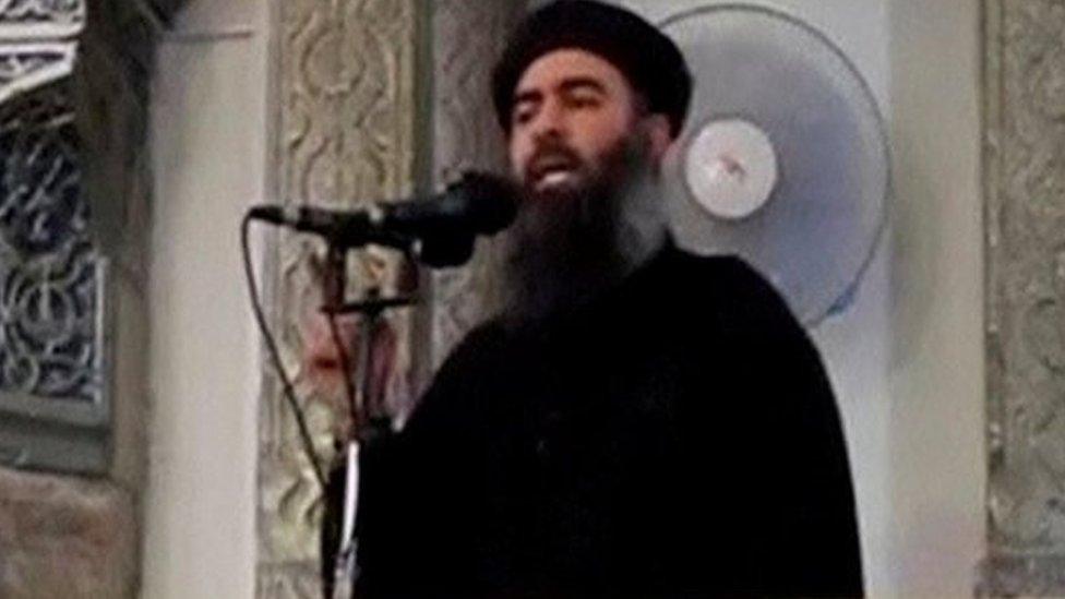 A man purported to be the reclusive leader of the militant Islamic State Abu Bakr al-Baghdadi making what would have been his first public appearance, at a mosque in the centre of Iraq's second city, Mosul, according to a video recording posted on the Internet on July 5, 2014, in this still image taken from video.