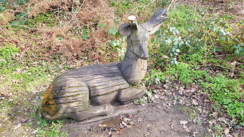 The stag sculpture in Savernake Park, with antlers sawn off