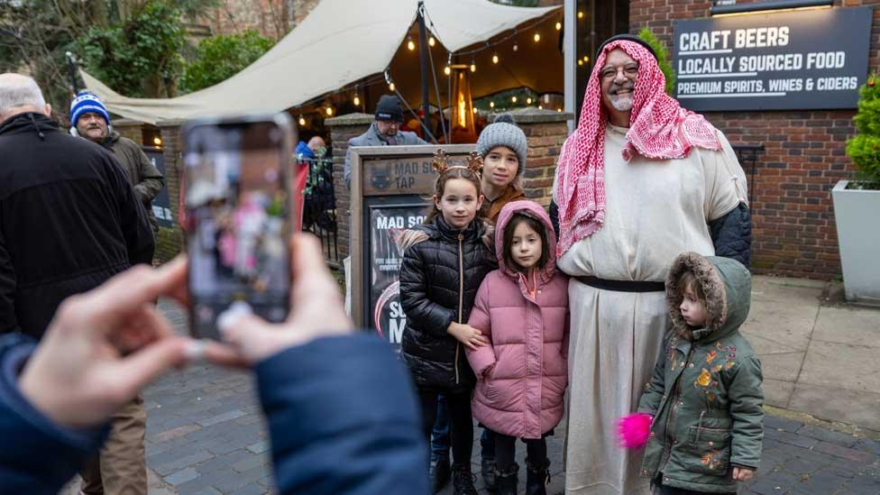 An innkeeper in the live nativity at St Albans Cathedral