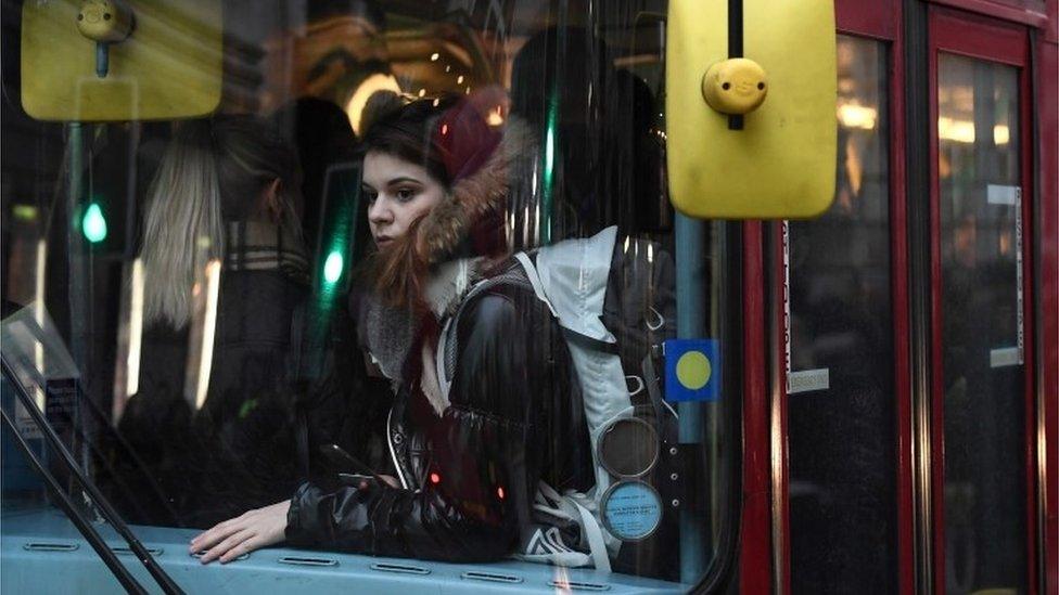 Woman on a bus