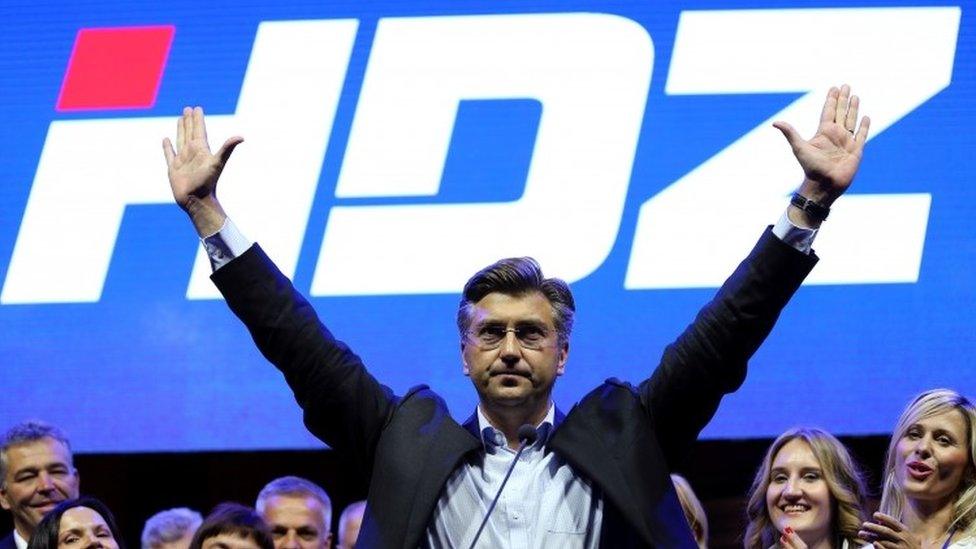 Andrej Plenkovic, president of Croatian Democratic Union (HDZ), waves to his supporters during an election rally in Zagreb (08 September 2016)