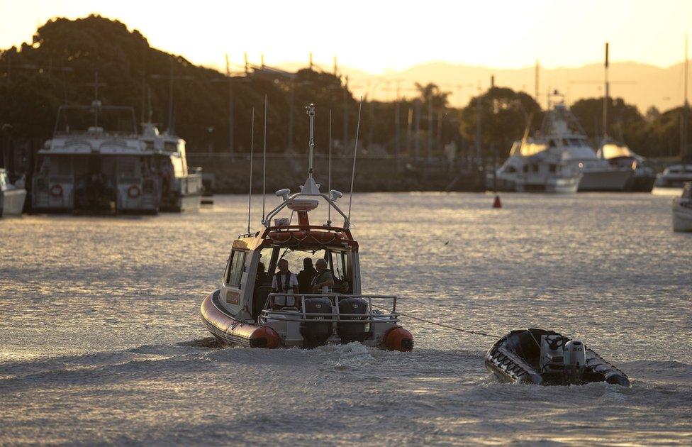 Coastguard rescue boats are pictured alongside the marina near Whakatane