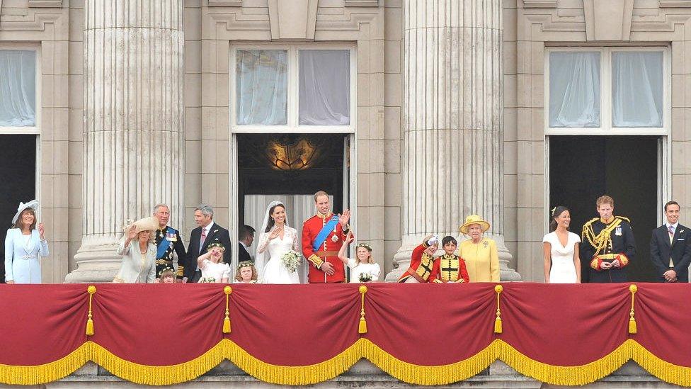 Prince William, Duke of Cambridge and Catherine, Duchess of Cambridge greet well-wishers next to members of their family on the balcony at Buckingham Palace