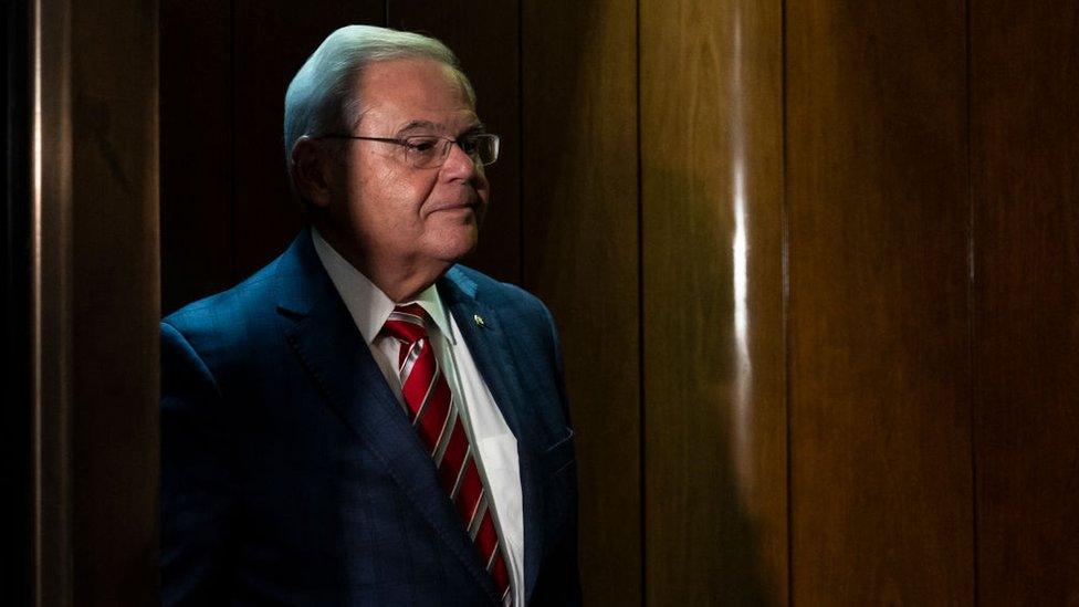 Bob Menendez stands in a Senate elevator