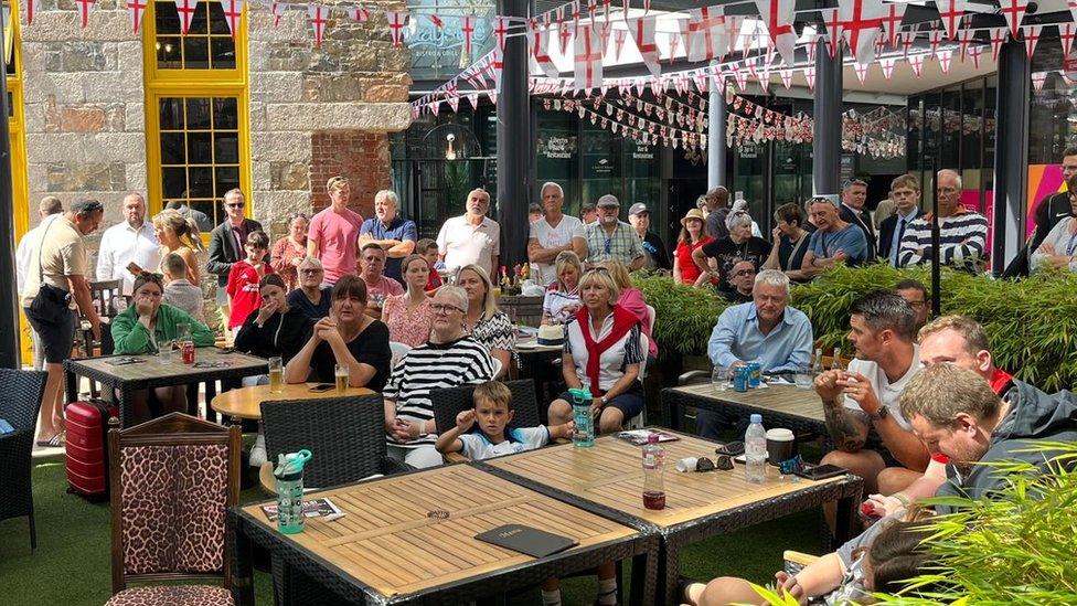 People watching England match at Liberty Wharf