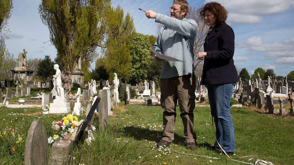 Archaeologist Mathew Morris and geneticist Dr Turi King in the cemetery.