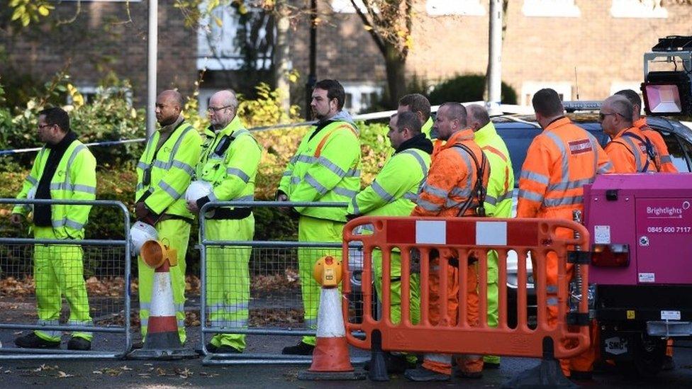 Workmen during Armistice Day silence