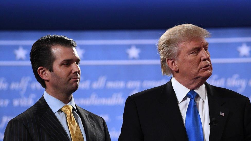 Donald Trump Jr. stands onstage with his father Donald Trump after presidential debate in Hempstead, New York on 26 September 2016