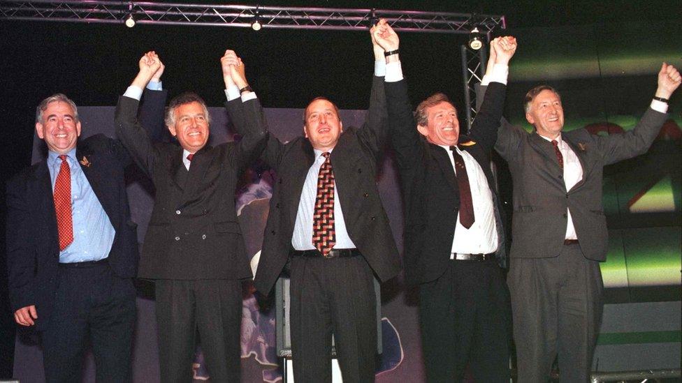 Dafydd Wigley, Peter Hain, Ron Davies, Wyn Griffiths and Richard Livsey celebrate the 'Yes' victory, 1997.