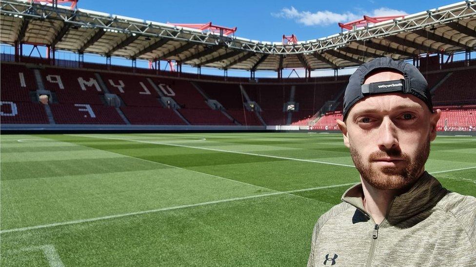 Andrew pitcured at the Georgios Karaiskakis Football Stadium in Greece