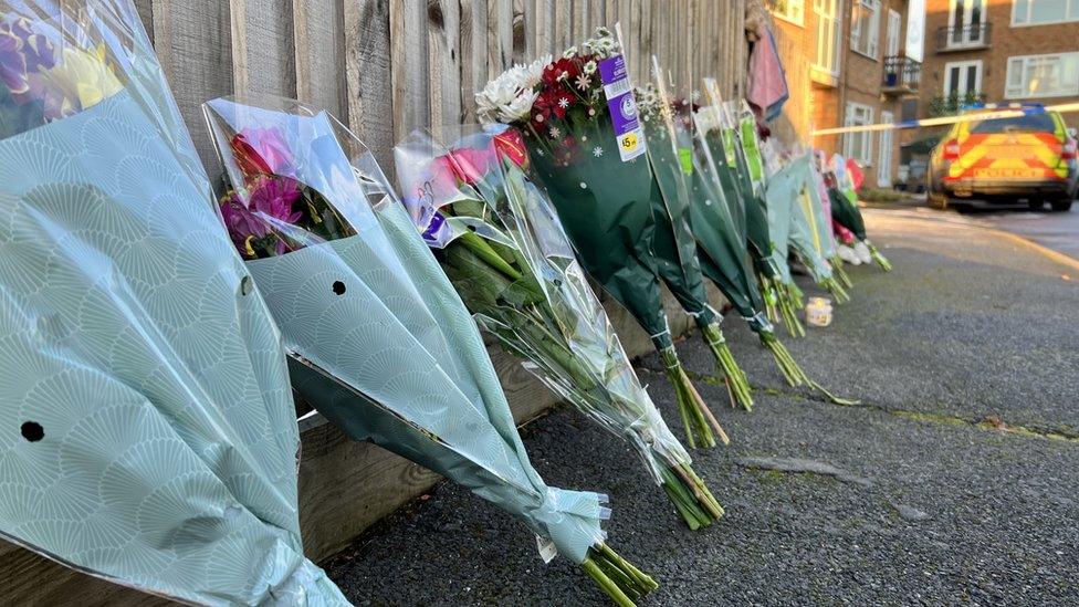 Flowers at the scene of a suspected murder in Kettering