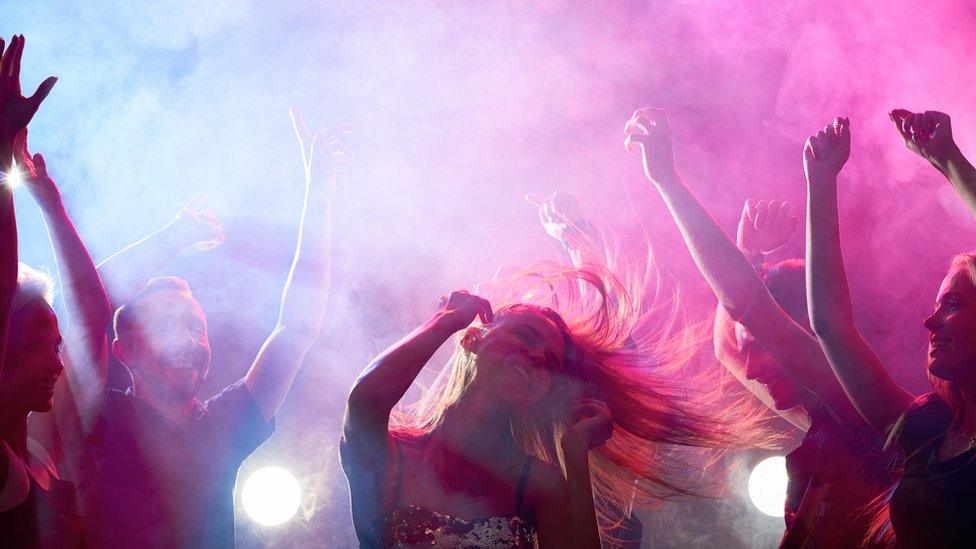 Woman dancing at nightclub (file image)