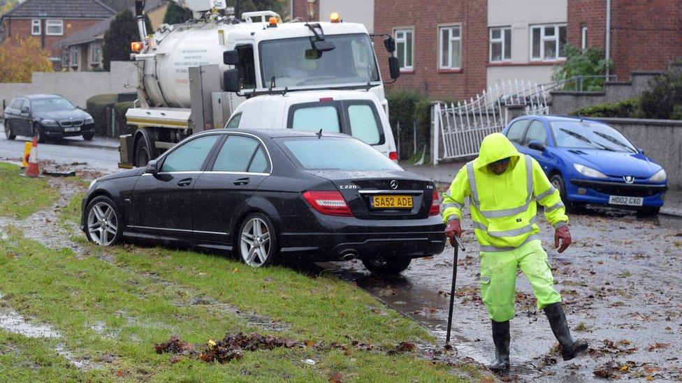 The clean up begins in Whitchurch Lane, Bristol