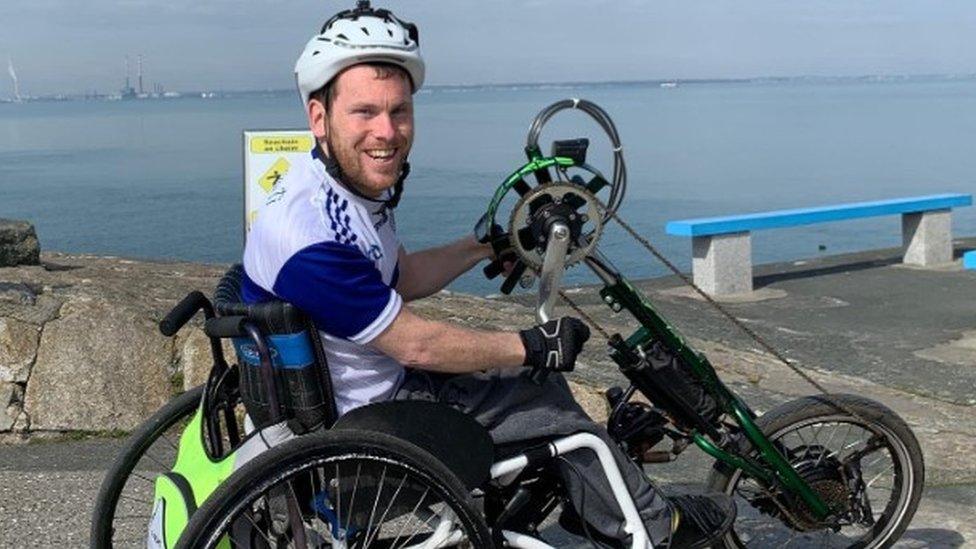 Ellis Palmer using his handcycle