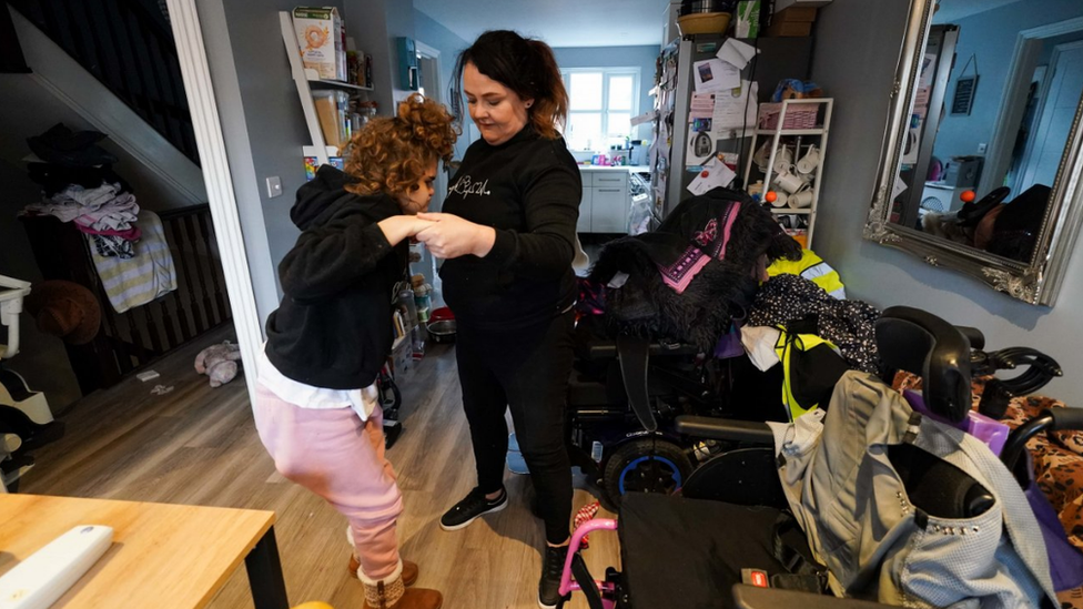 Karen and her daughter Josselin,16, in their home in Westbury, Wiltshire