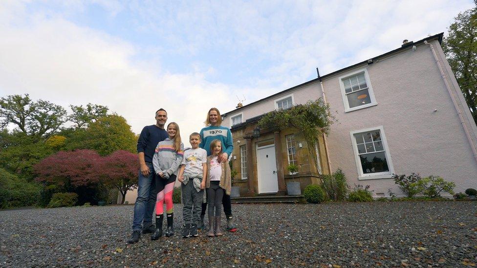 Homeowners Karen and Matt, their daughters Cora and Marnie and son, William, outside The Moss, a Georgian renovation in Killearn