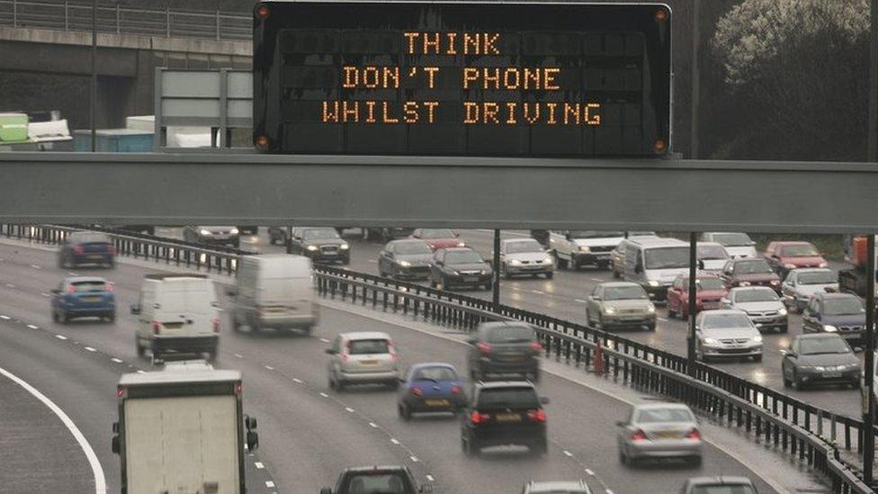 Motorway sign urging drivers not to use their phones