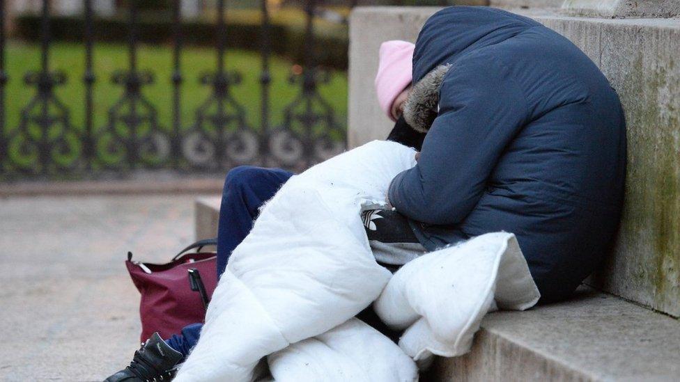 Homeless people with blanket