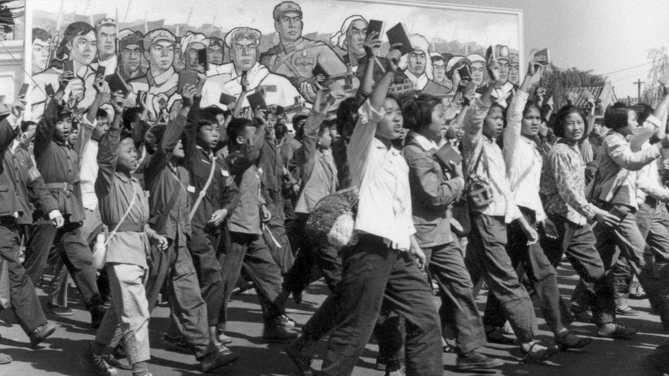 Red Guards, high school and university students, waving copies of Chairman Mao Zedong's Little Red Book in 1966