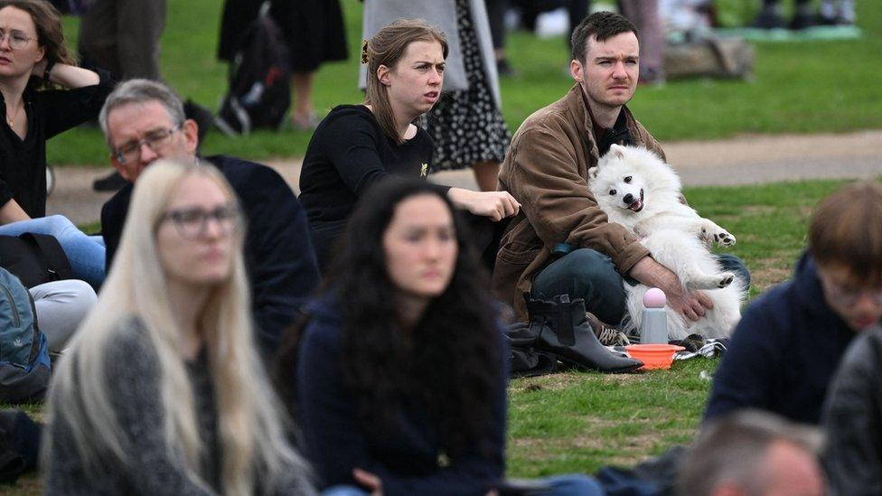 People gather in Hyde Park where the State Funeral Service of Britain's Queen Elizabeth II will be shown on a large screen