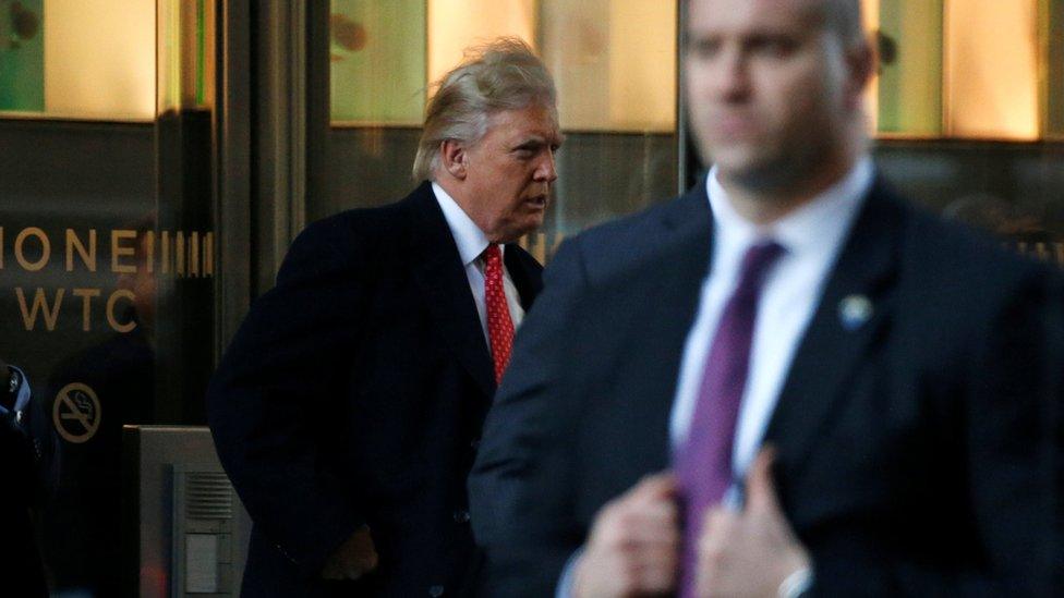 U.S. President-elect Donald Trump exits One World Trade Center following a meeting in Manhattan, New York City,