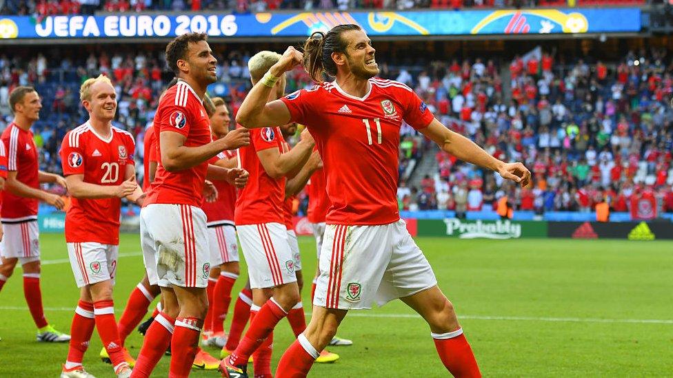 Wales players celebrate their 1-0 victory over Northern Ireland securing them a quarter final place