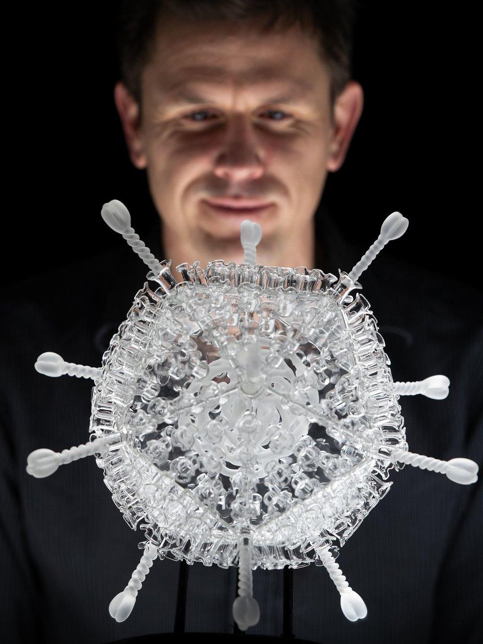 Luke Jerram with his sculpture