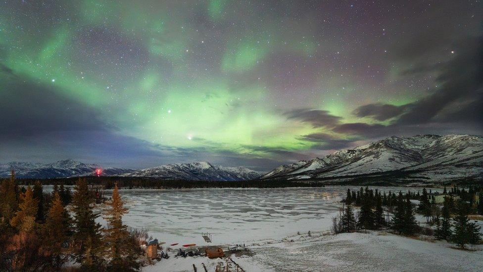 Northern lights over Alaskan Lake