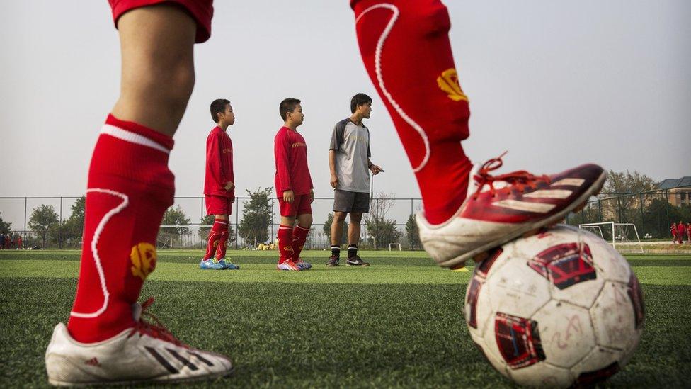 Chinese students at a football academy