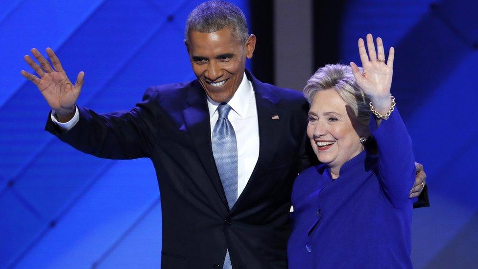 In this July 27, 2016 file photo, President Barack Obama and Democratic presidential nominee Hillary Clinton wave to delegates after President Obama"s speech during the third day of the Democratic National Convention in Philadelphia.