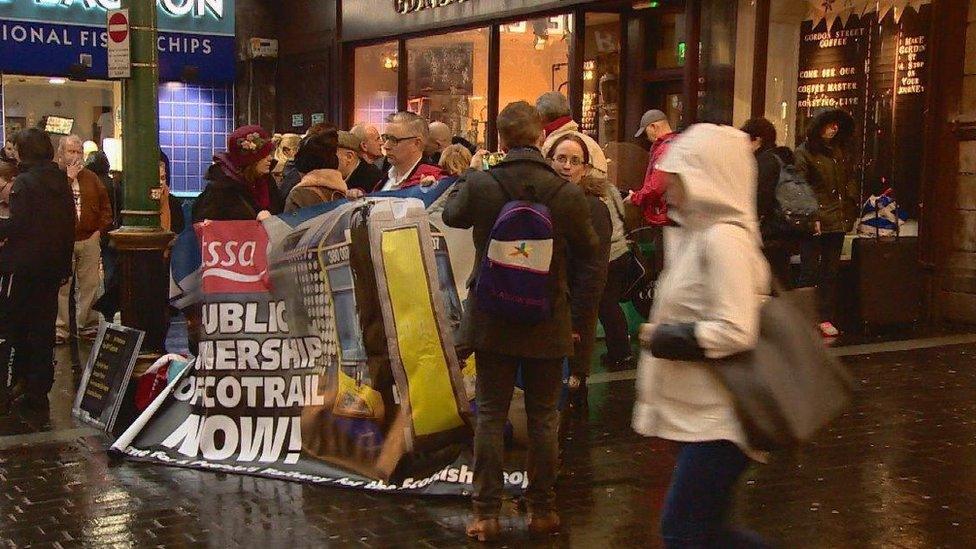 Protesters outside Glasgow Central